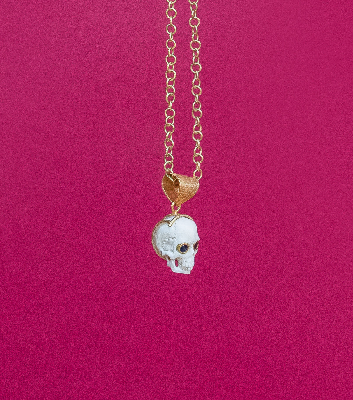 Sapphire Eyes Skull Pendant