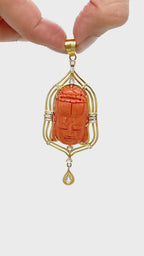 Carved Coral Buddha Pendant