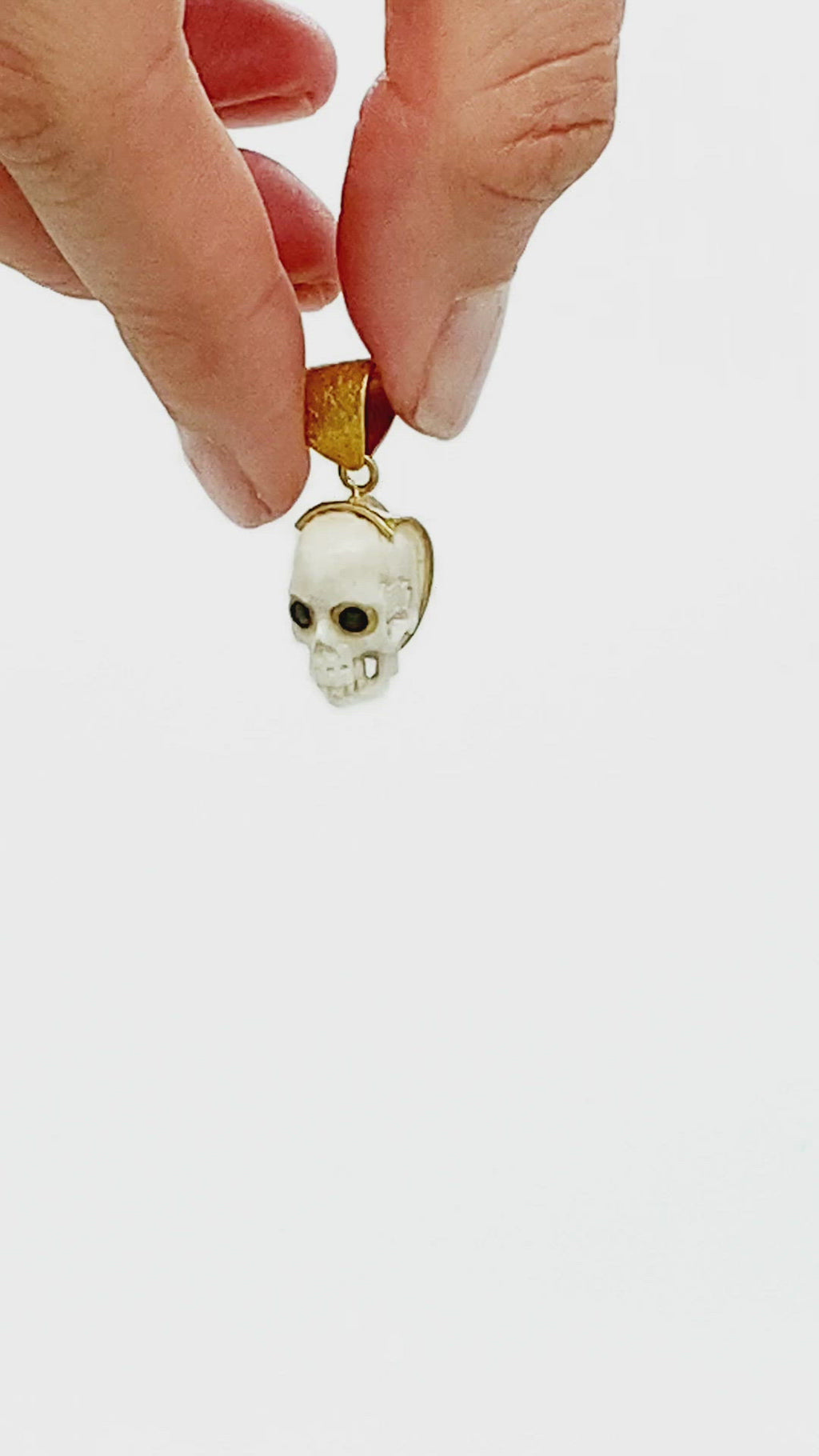 Sapphire Eyes Skull Pendant
